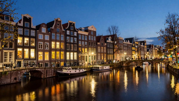 Amsterdam canal houses at dusk - the Netherlands' most romantic dating destination