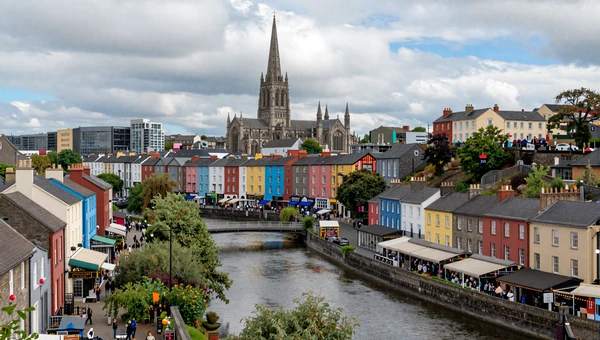 Cork city with the River Lee and colorful hillside houses - charming southern Ireland dating destination